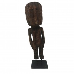 PRIMITIVE WOOD SKEW STATUE 